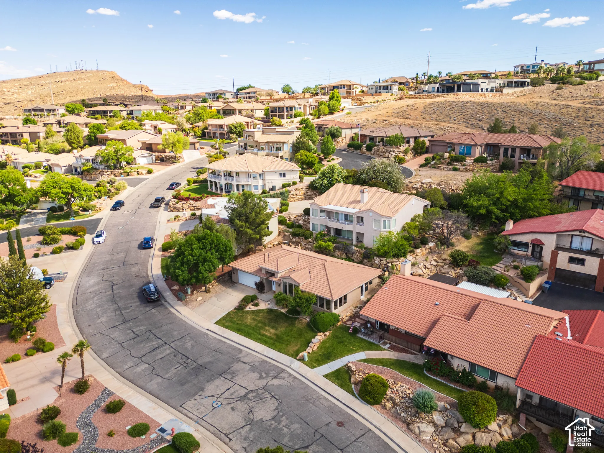 Residential area featuring a paved street and varied architectural styles