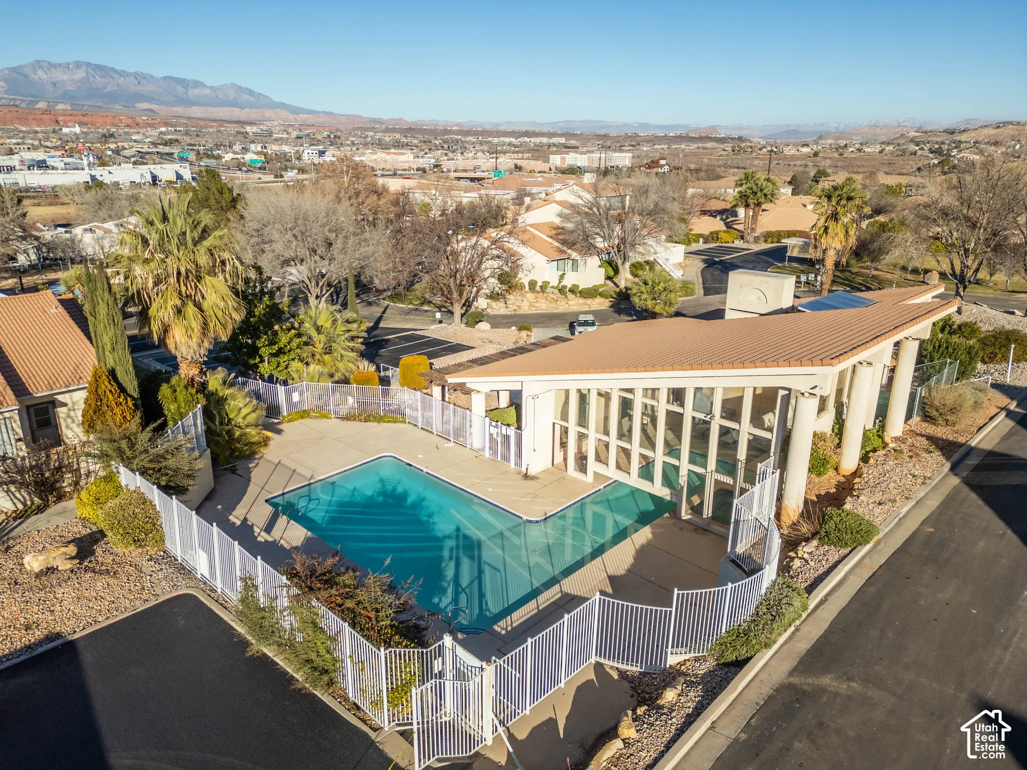 View of pool featuring a residential view, a mountain view, and a patio