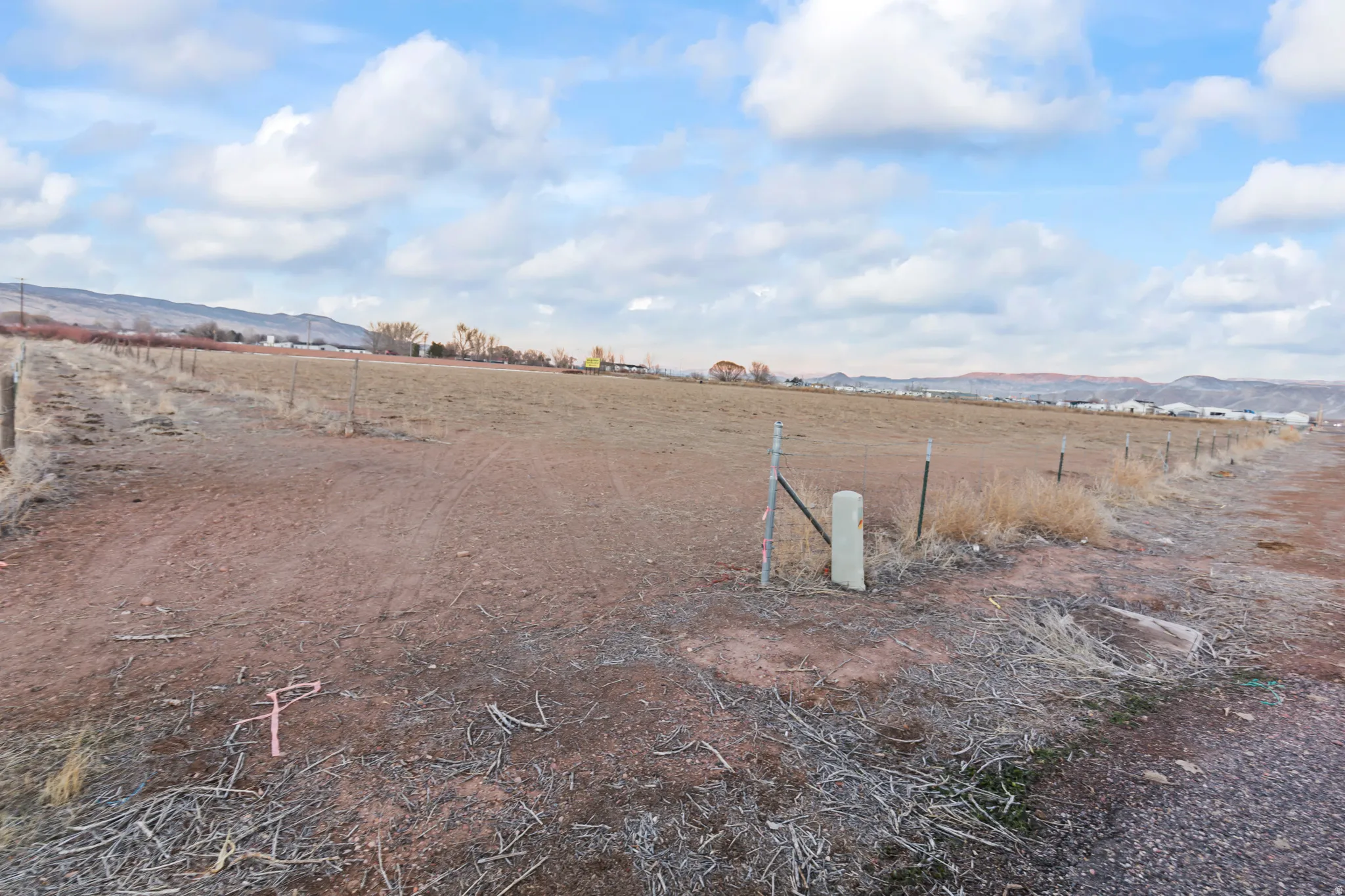 View of yard with a mountain view and a rural view