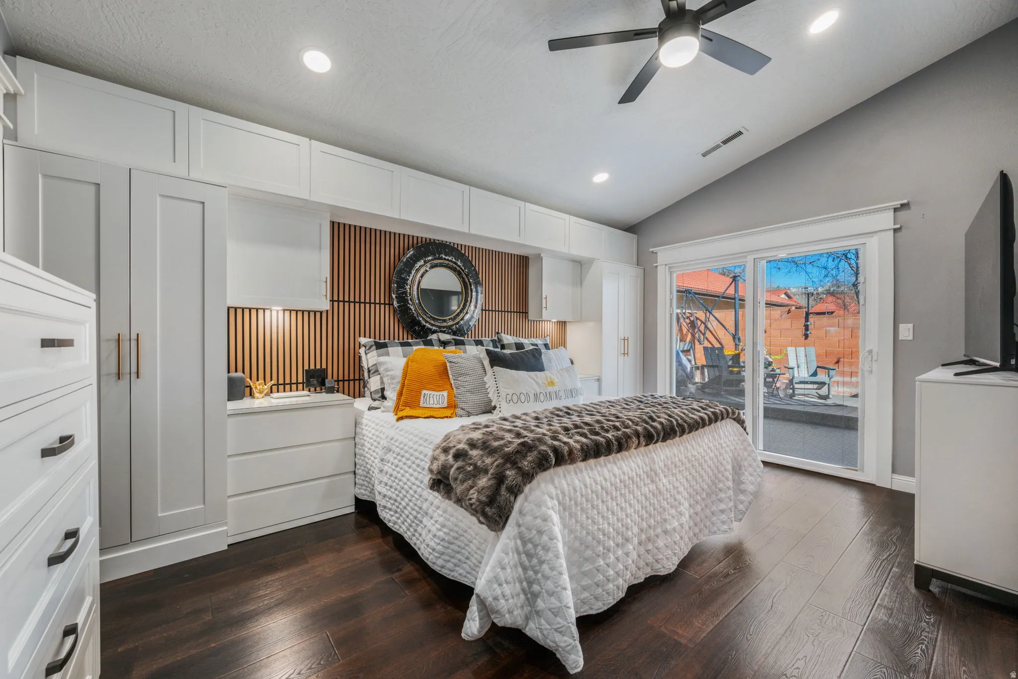 Bedroom featuring recessed lighting, access to outside, vaulted ceiling, dark wood-style flooring, and ceiling fan