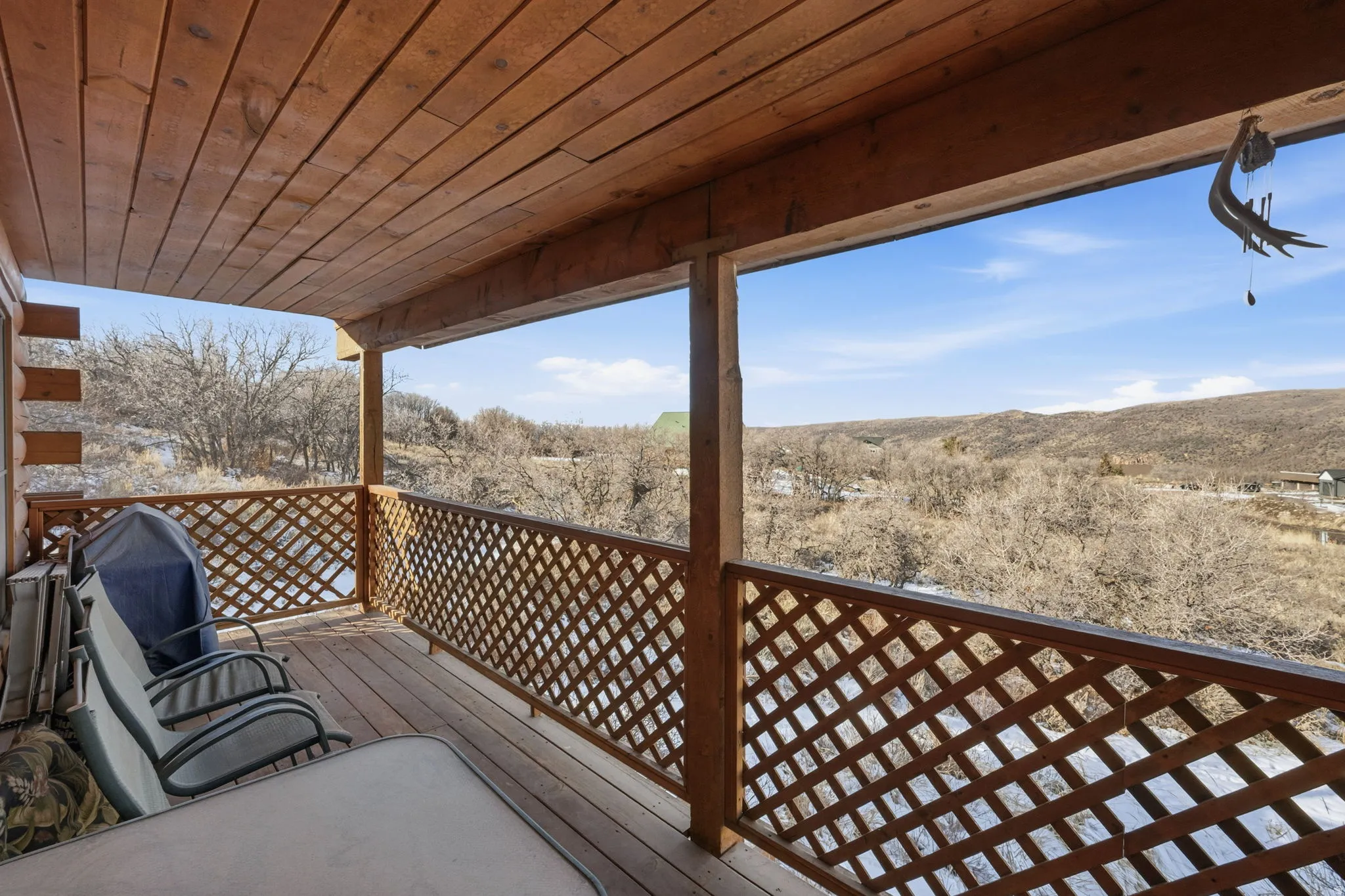 Wooden deck with a grill