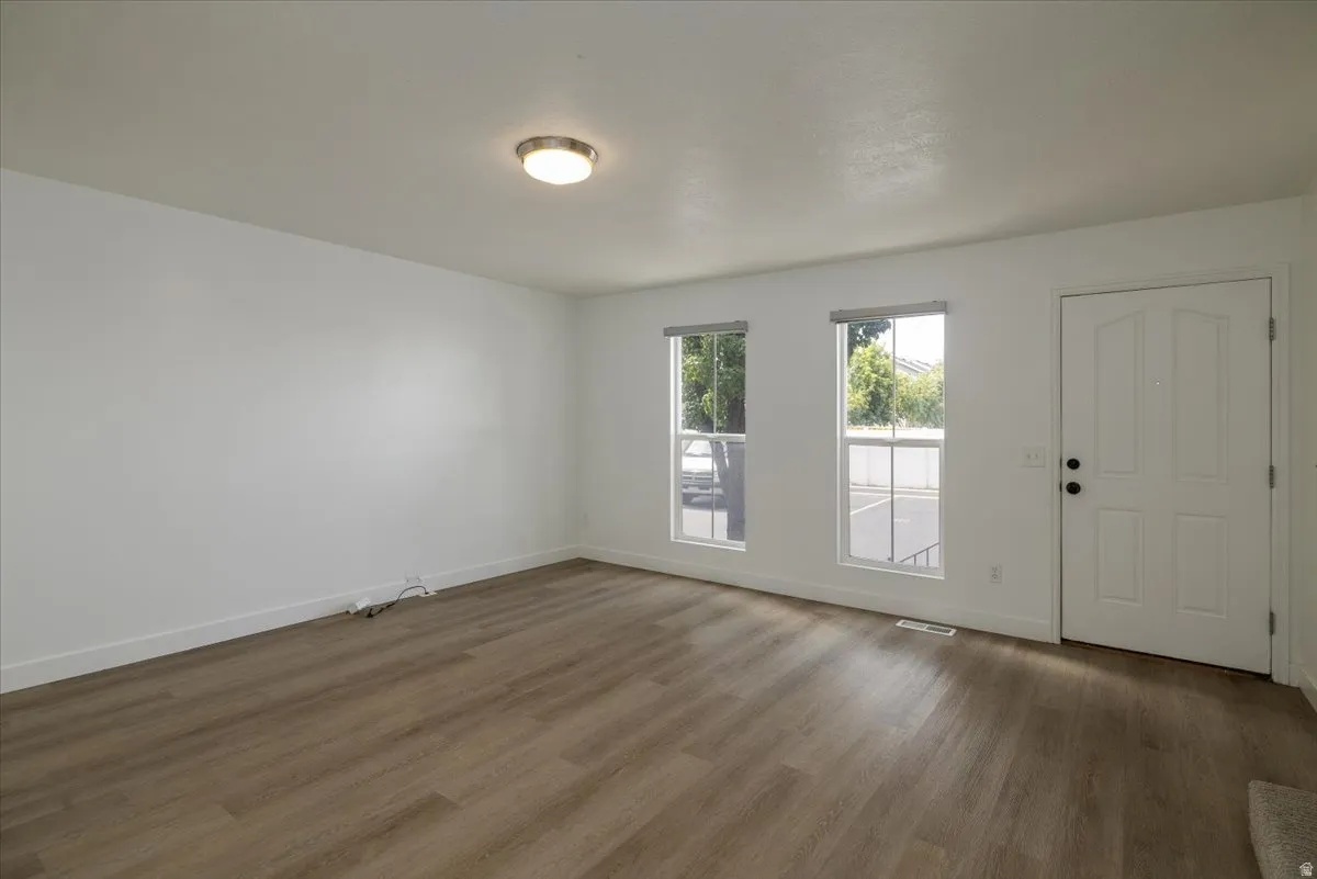 Entryway with wood finished floors