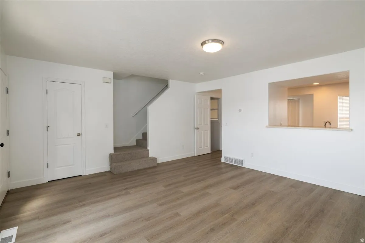 View of stairs and kitchen entry
