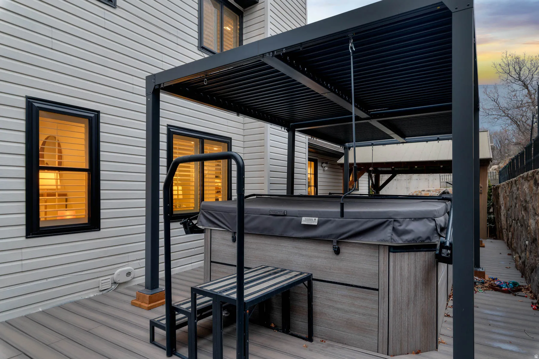 All patio furniture, swim spa, and both pergolas are included in the sale