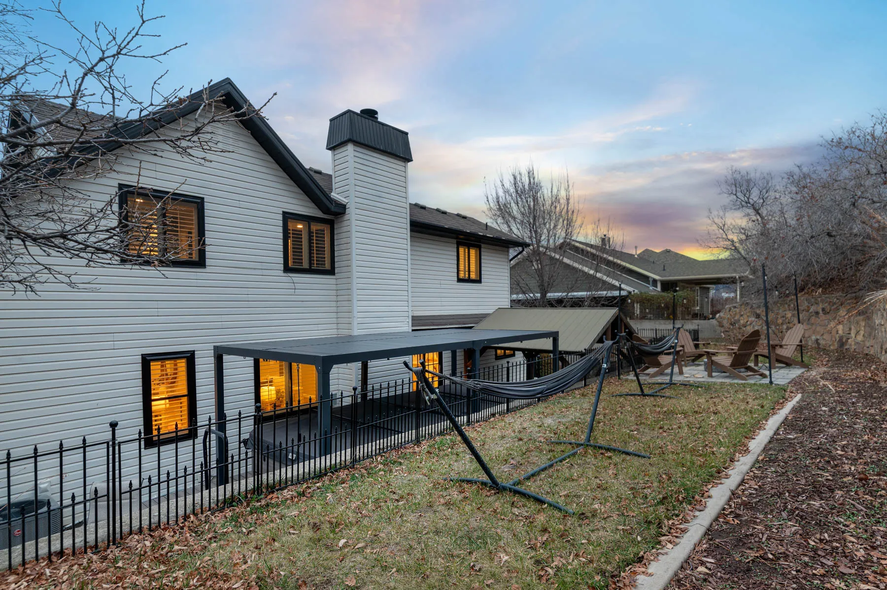 All patio furniture, swim spa, and both pergolas are included in the sale