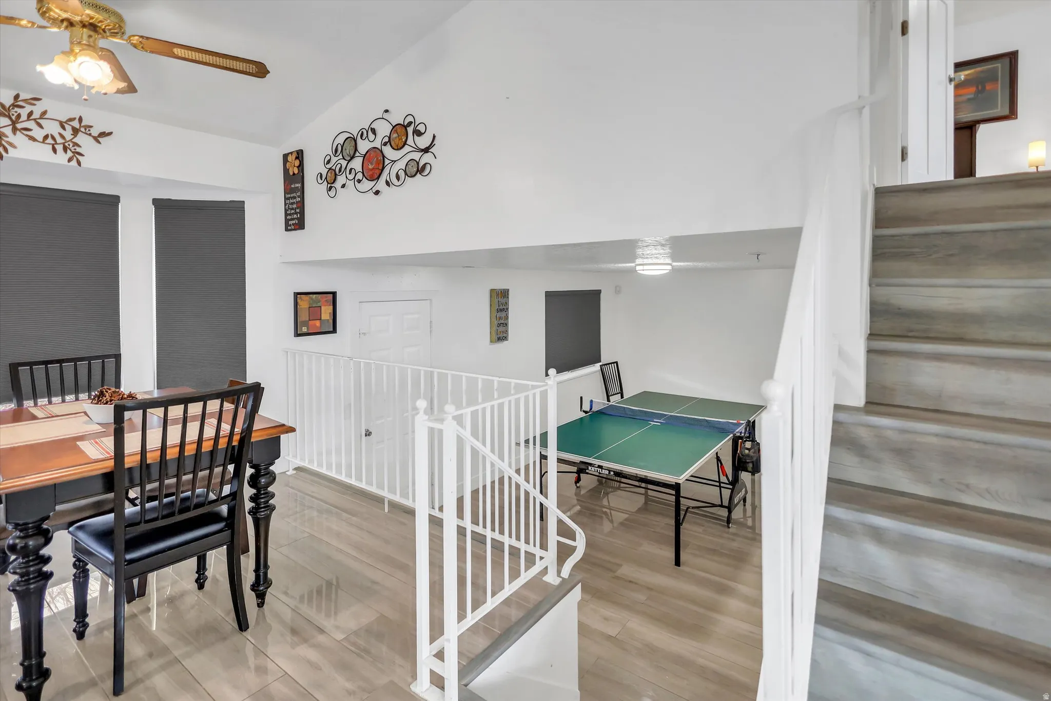Playroom featuring a ceiling fan and light wood-style flooring