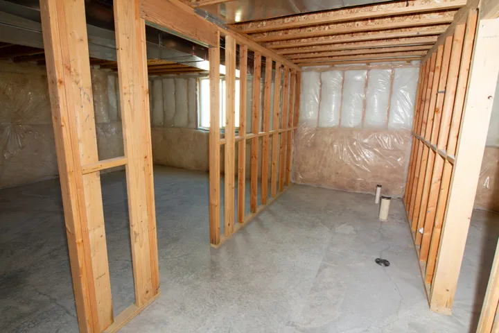 Spacious unfinished basement. Partially framed.