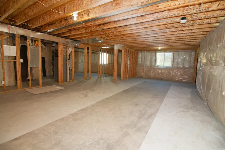 Spacious unfinished basement. Partially framed.