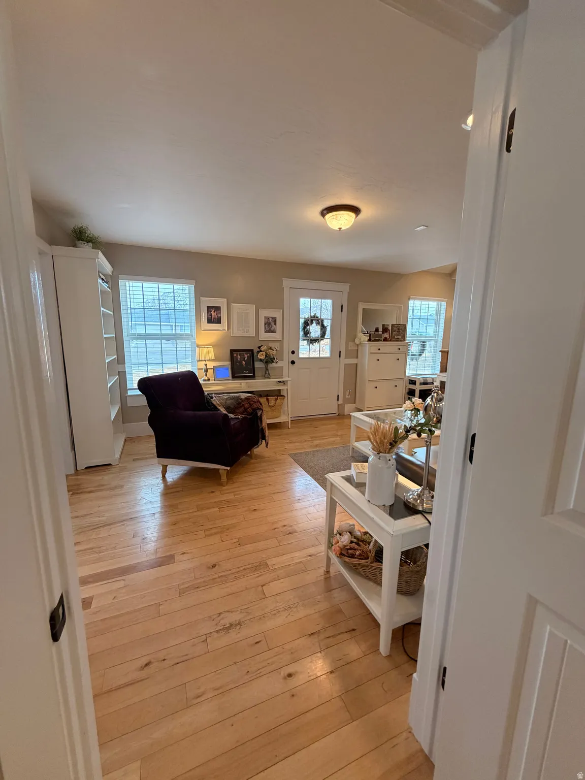 Corridor with light wood finished floors