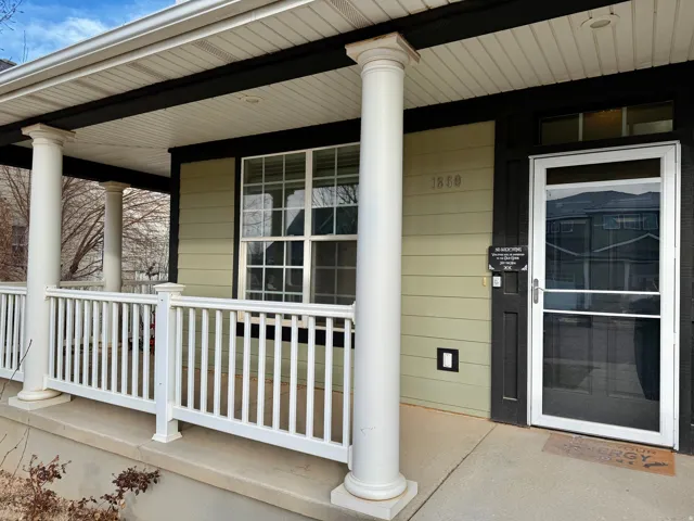Entrance to property with covered porch