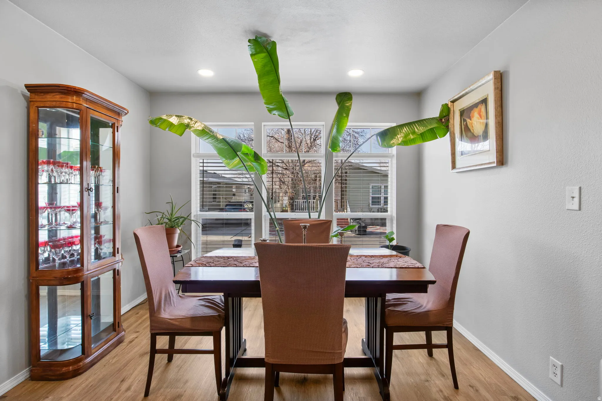 Dining space with light wood-type flooring