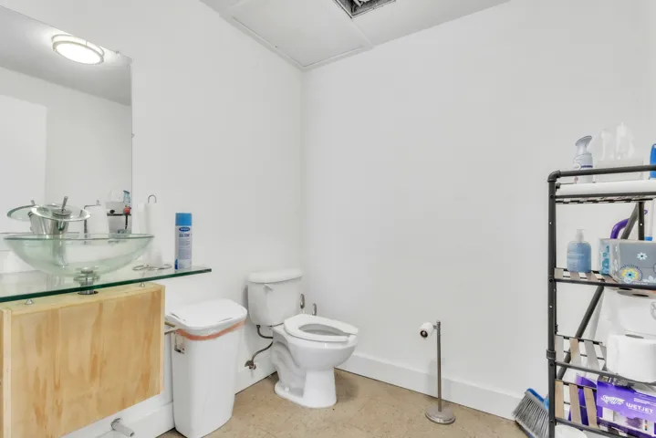 Half bath with toilet and vanity