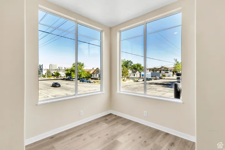 Empty room featuring light wood-style floors and baseboards