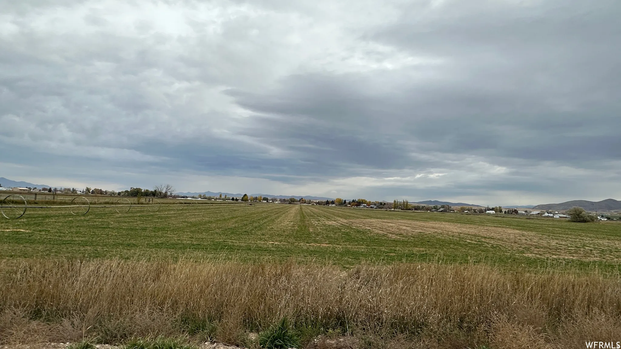 View of nature featuring rural landscape and a mountain backdrop