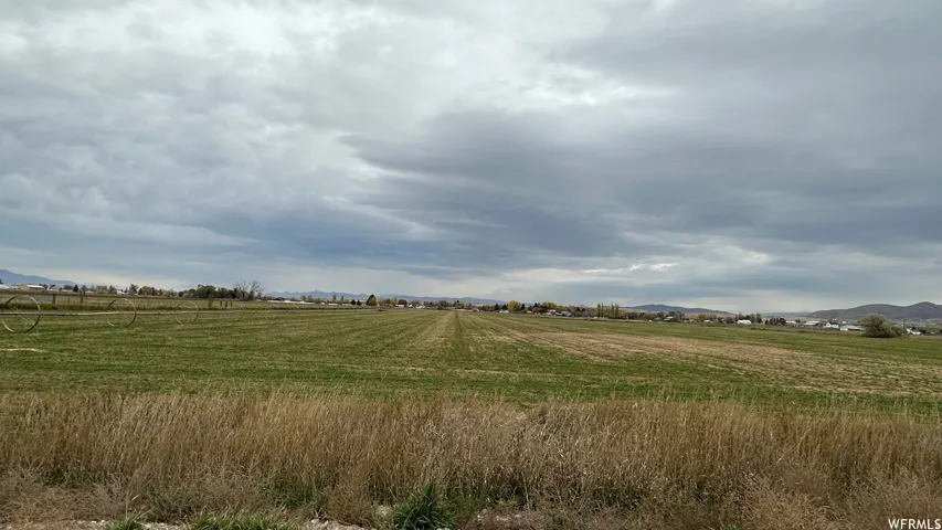 View of nature featuring rural landscape and a mountain backdrop