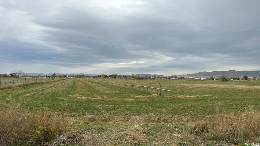 View of yard featuring a mountain view and a view of countryside
