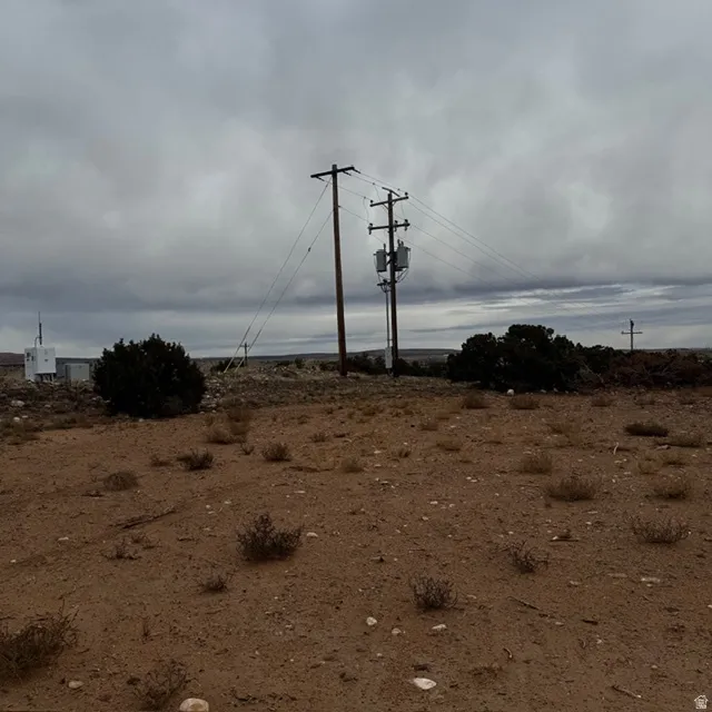power lines sit at the top of the drive leading to the property.  right on the property line