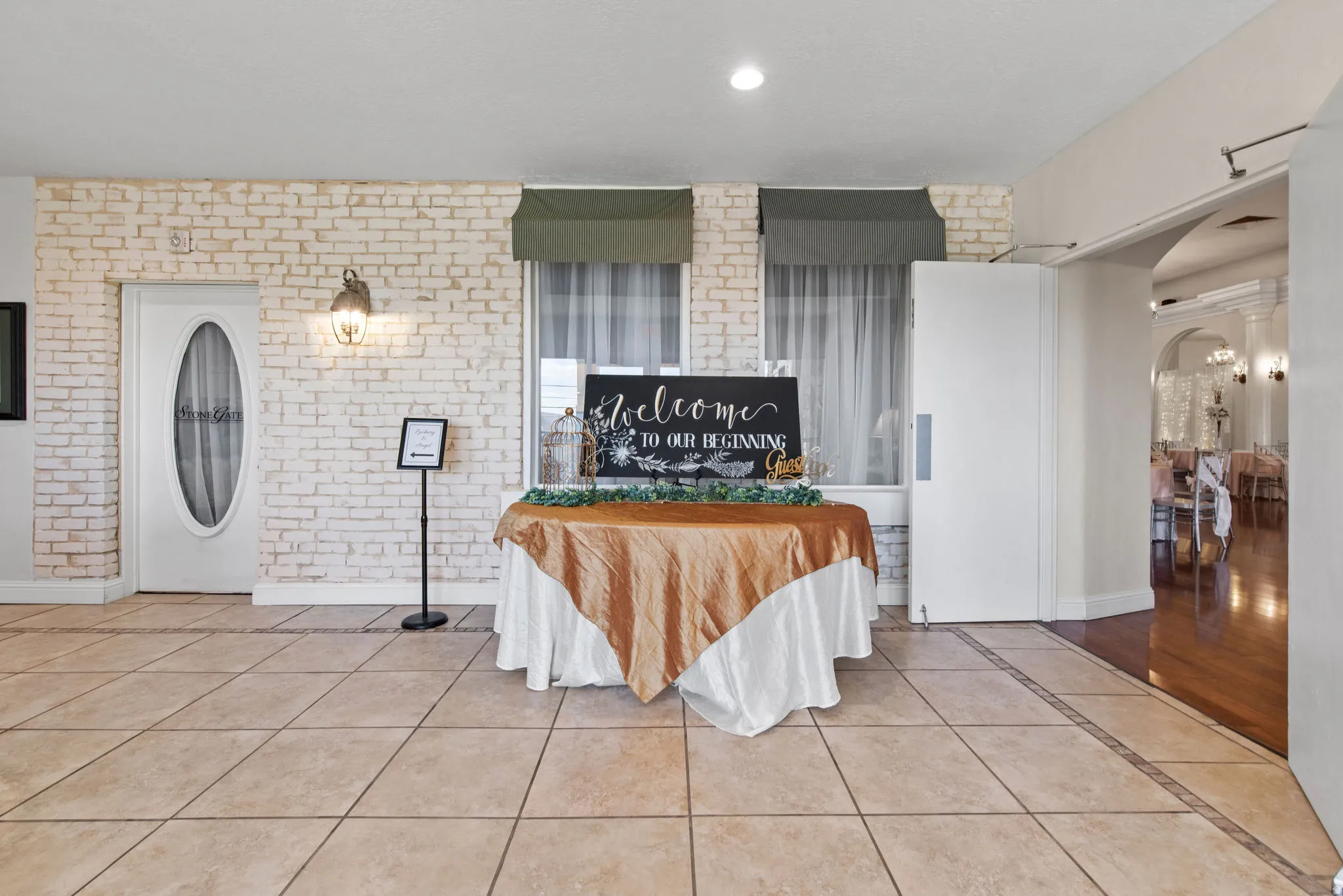 Kitchen with brick wall and arched walkways