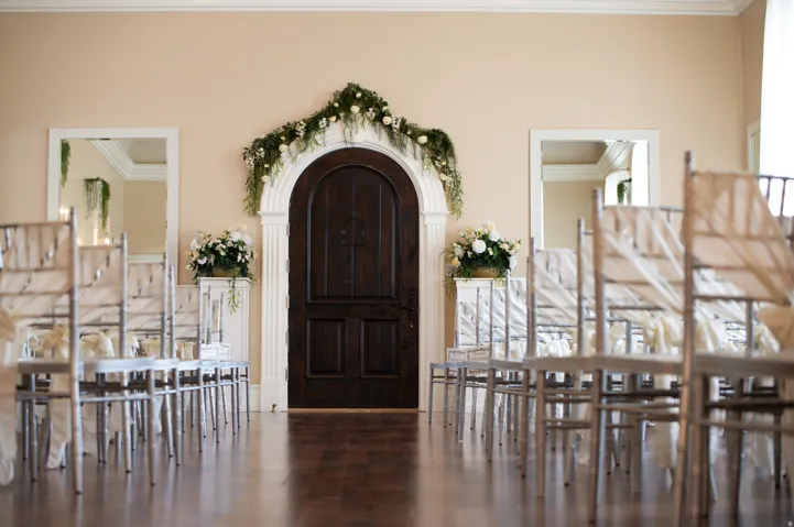 Foyer featuring ornamental molding and wood finished floors