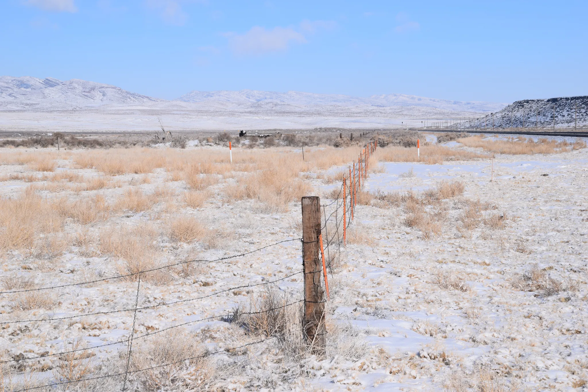 View of mountain background featuring rural landscape