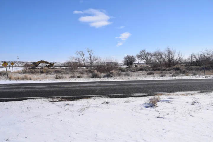 View of yard layered in snow