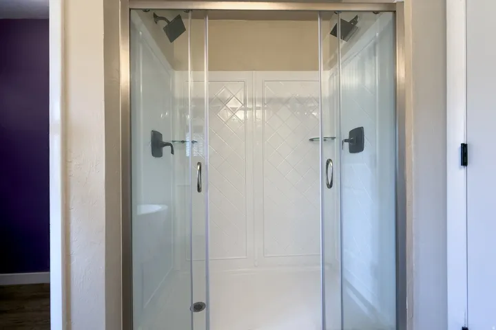 Full bathroom featuring dual head shower