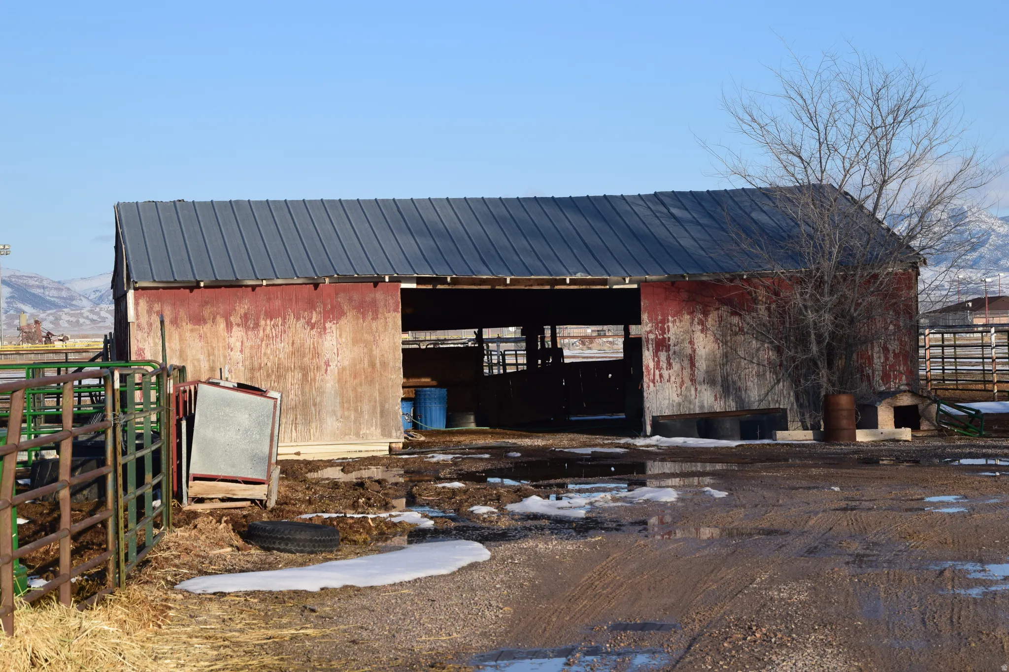 View of outbuilding with a mountain view and an exterior structure