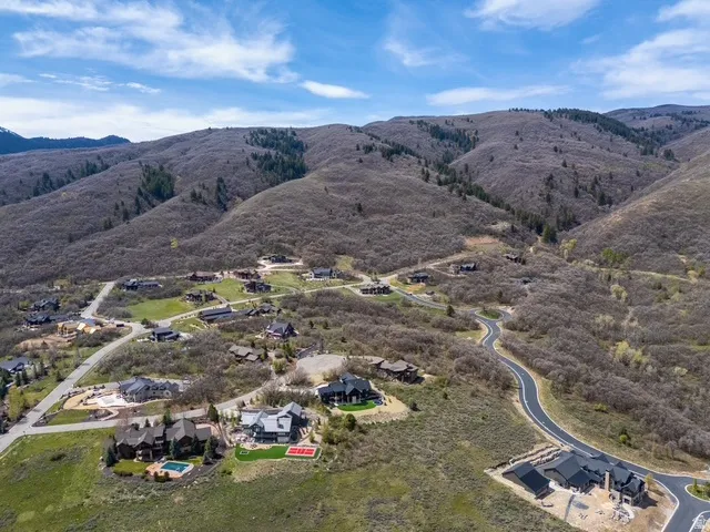 Aerial perspective of suburban area featuring mountains