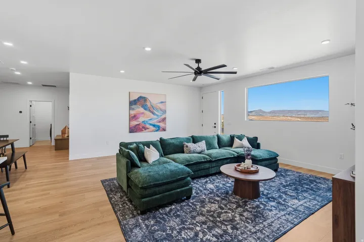 Light wood-finish flooring with recessed lighting