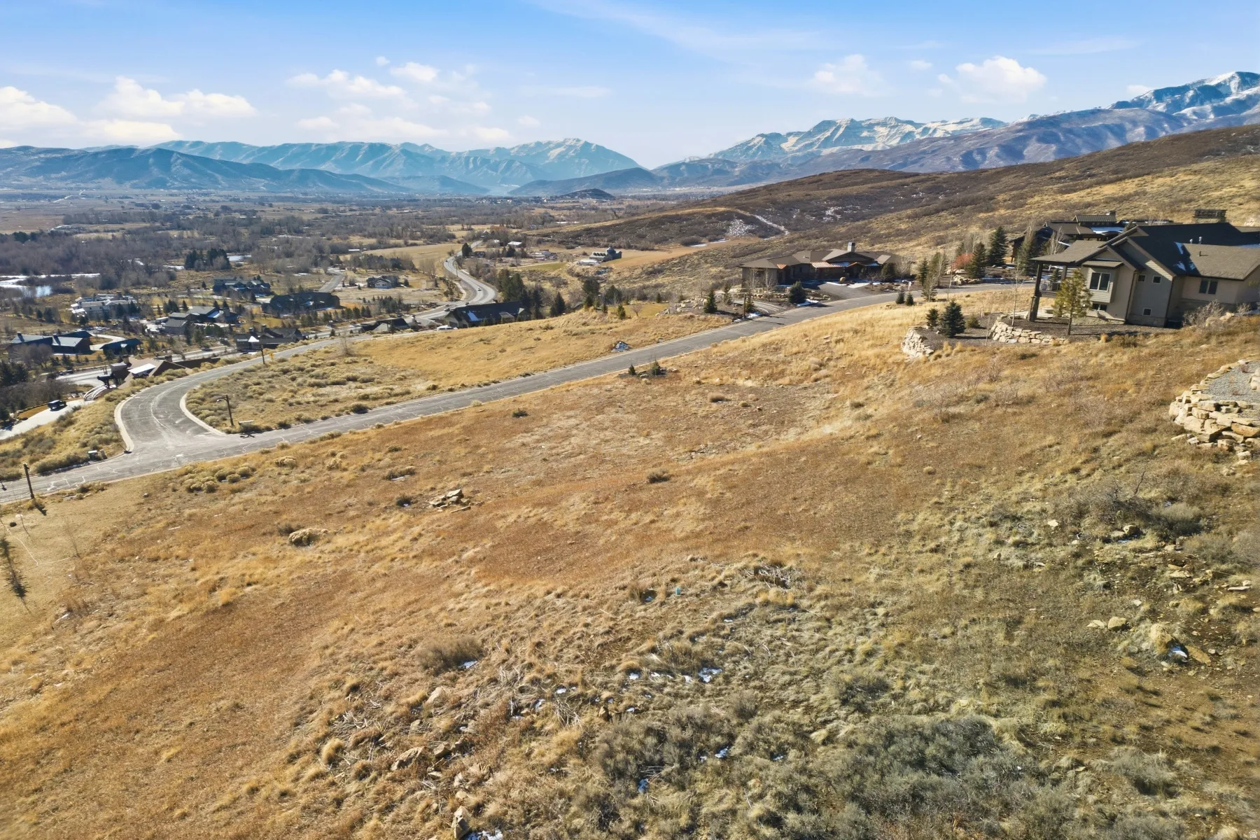 Mountain view featuring nearby suburban area