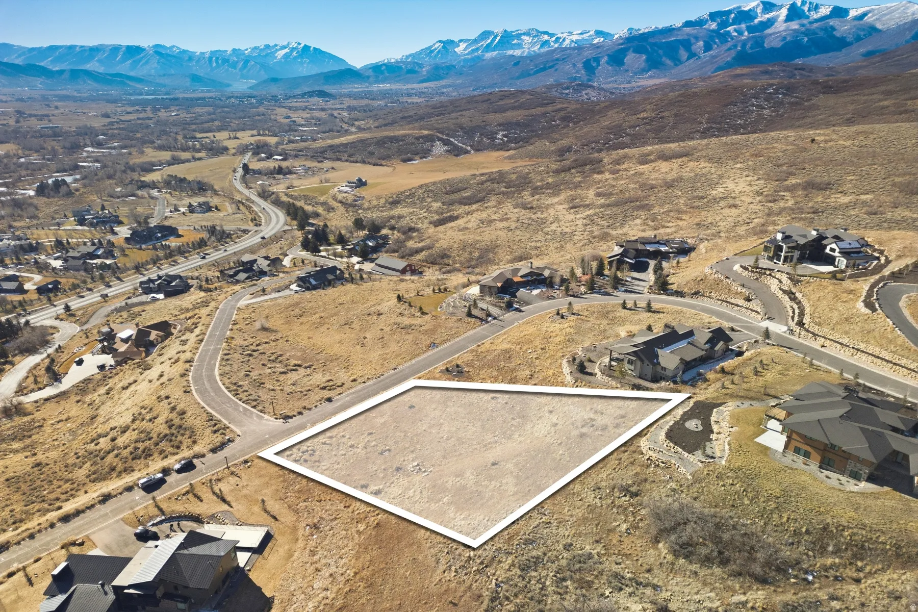 Aerial view of residential area with a mountain backdrop