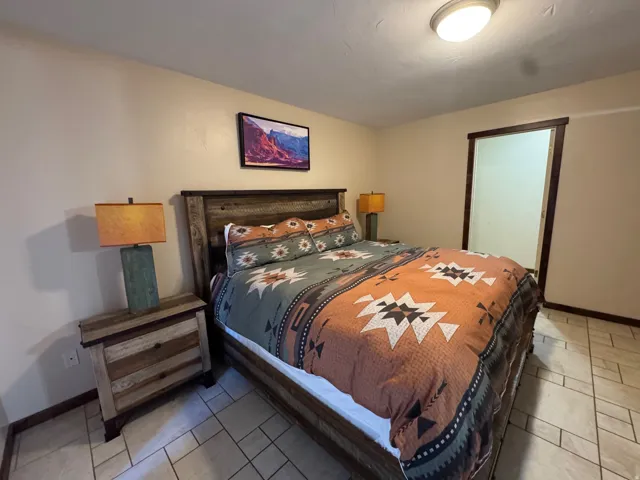 Bedroom with baseboards