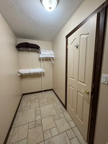 View of master walk in closet
