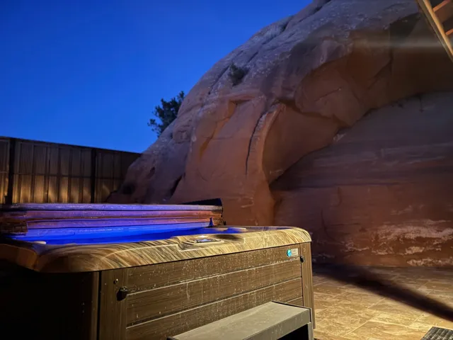 View of patio featuring a hot tub