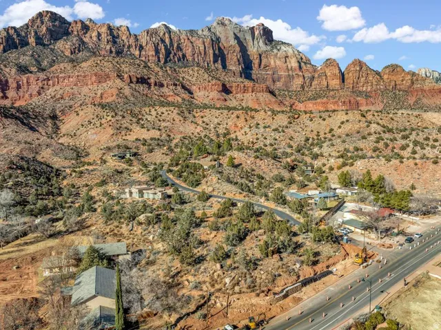 View of mountain backdrop with a desert landscape and rural landscape