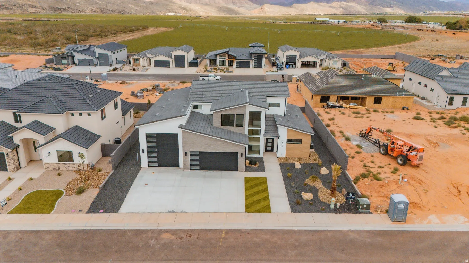 Aerial perspective of suburban area with mountains