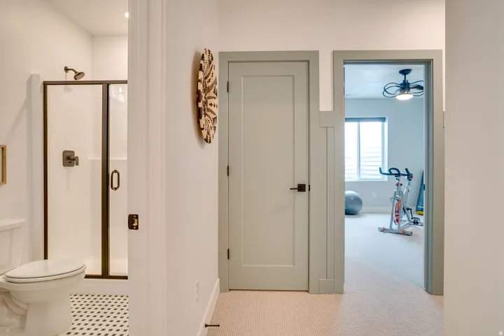 Hallway with carpet floors