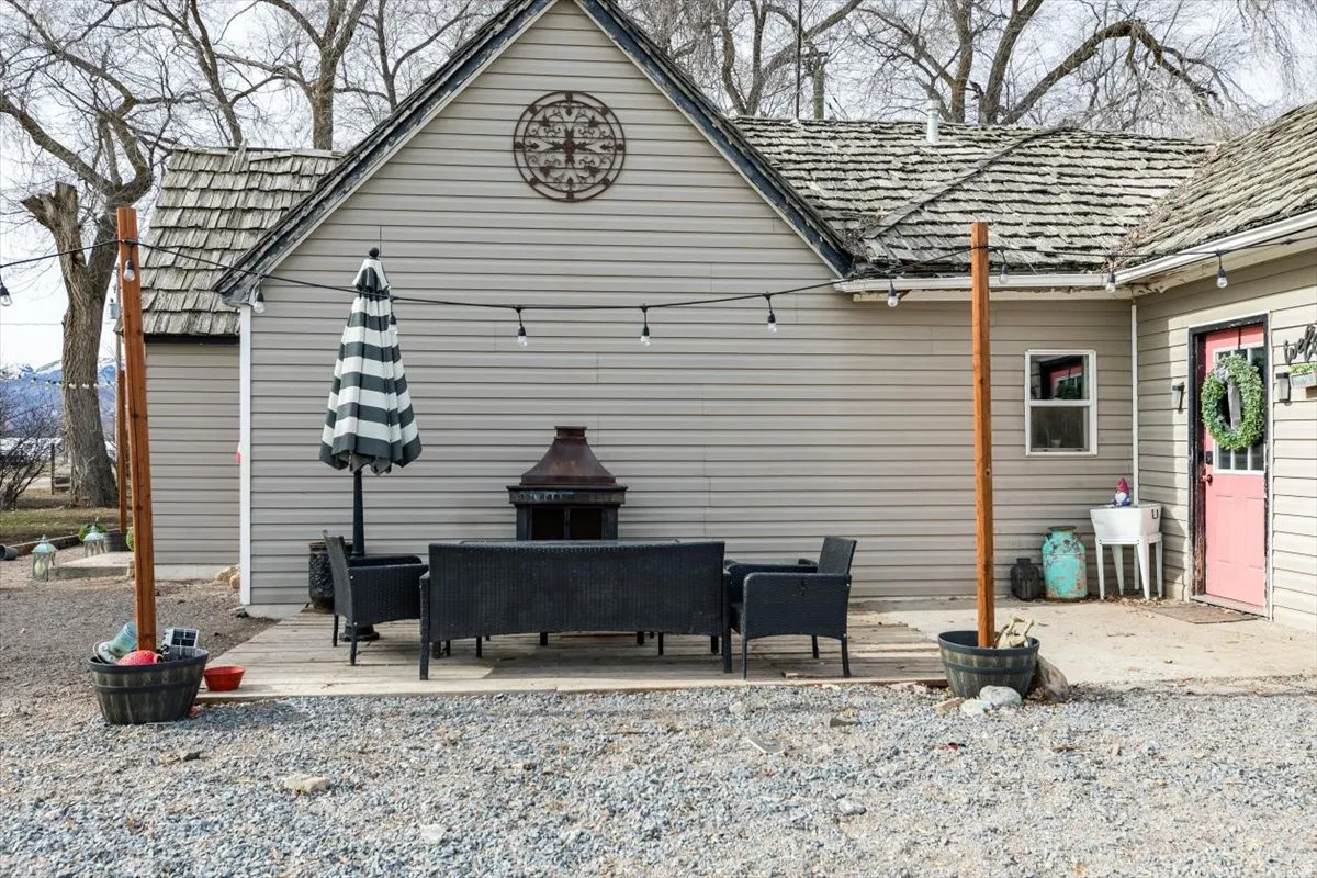 Rear view of property featuring a patio