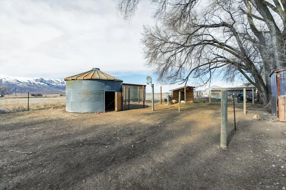 View of yard featuring an outbuilding and a mountain view