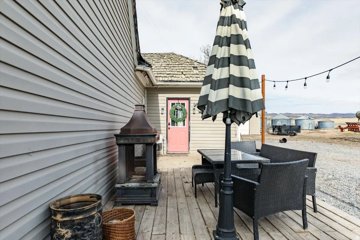 Wooden terrace featuring outdoor dining space
