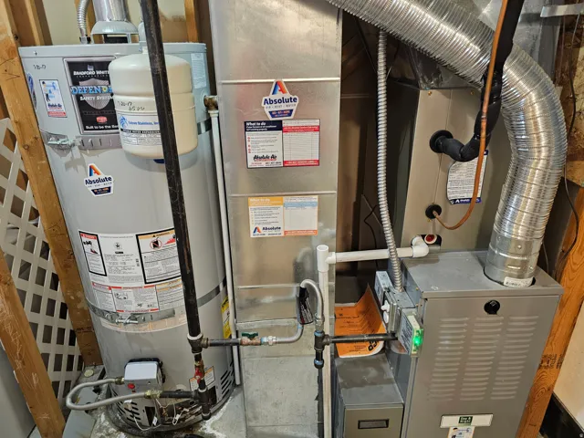Utilities featuring water heater and heating unit