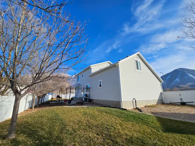 View of home's exterior with a mountain view
