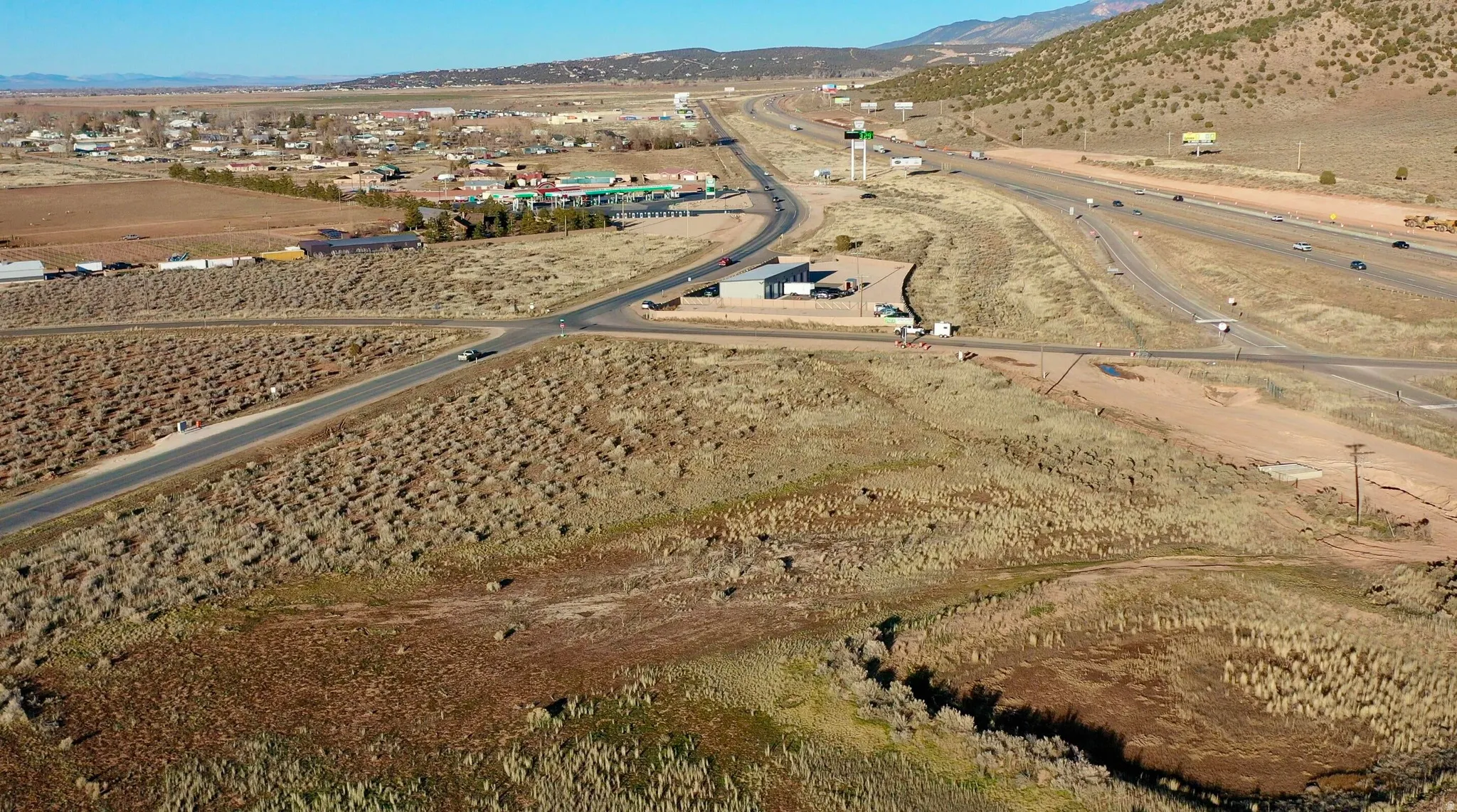 View of property location with a mountain backdrop and rural landscape