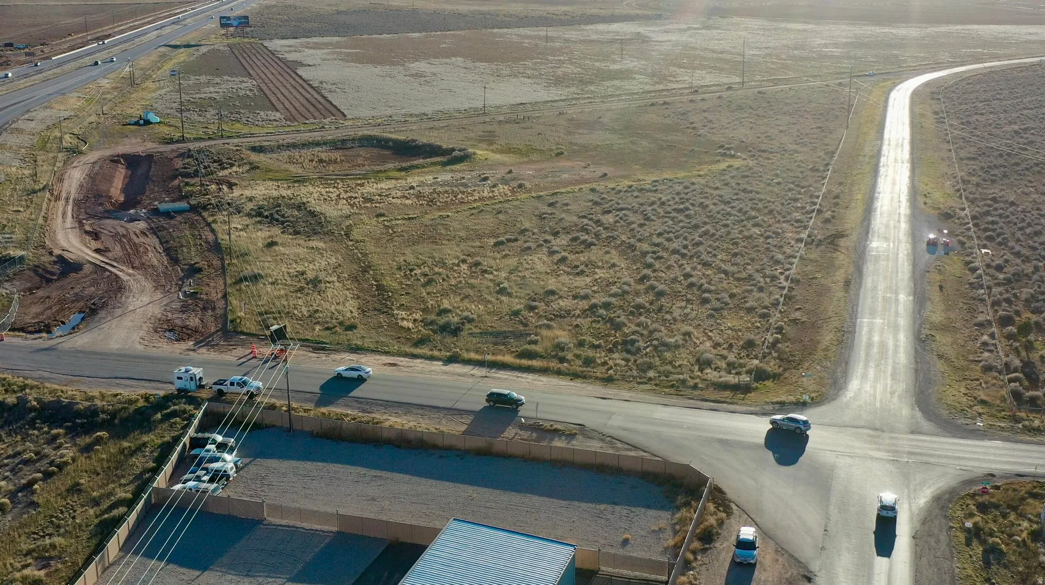 Overview of rural landscape with rows of crops
