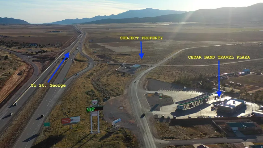 Aerial view of sparsely populated area featuring a mountainous background
