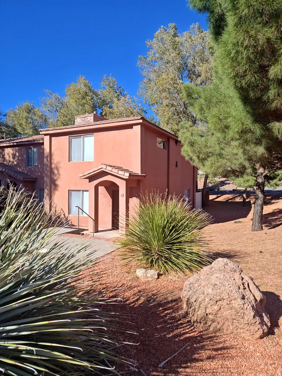 View of front of home featuring stucco siding