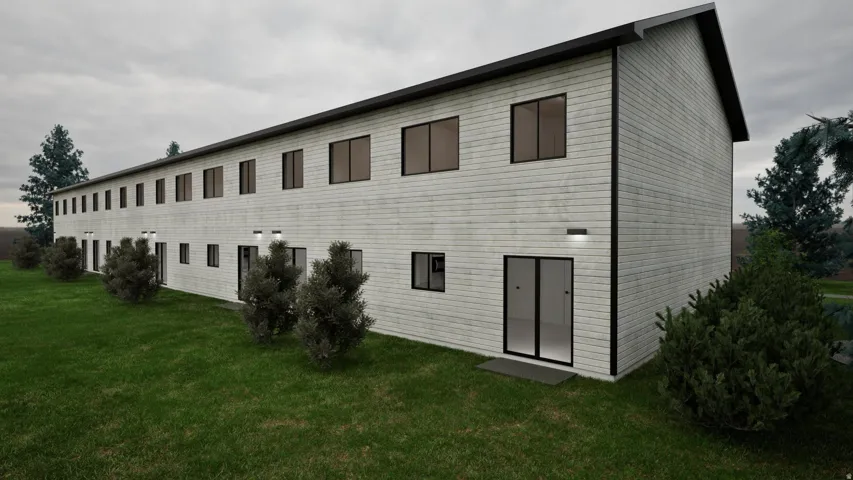 Rear view of house with a yard