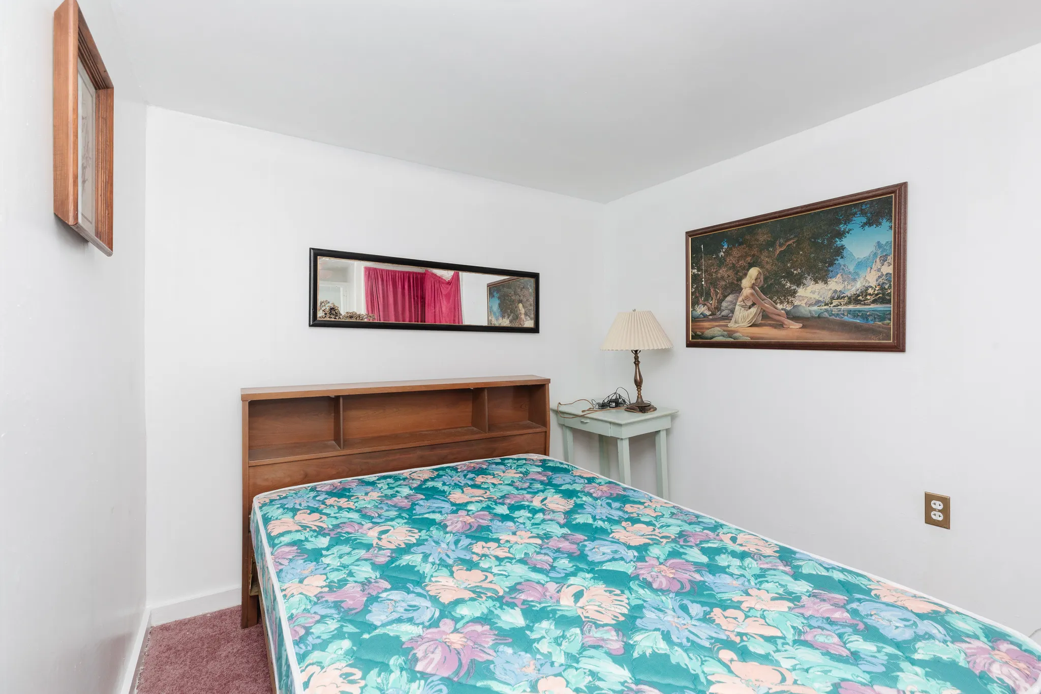 Bedroom with carpet and baseboards