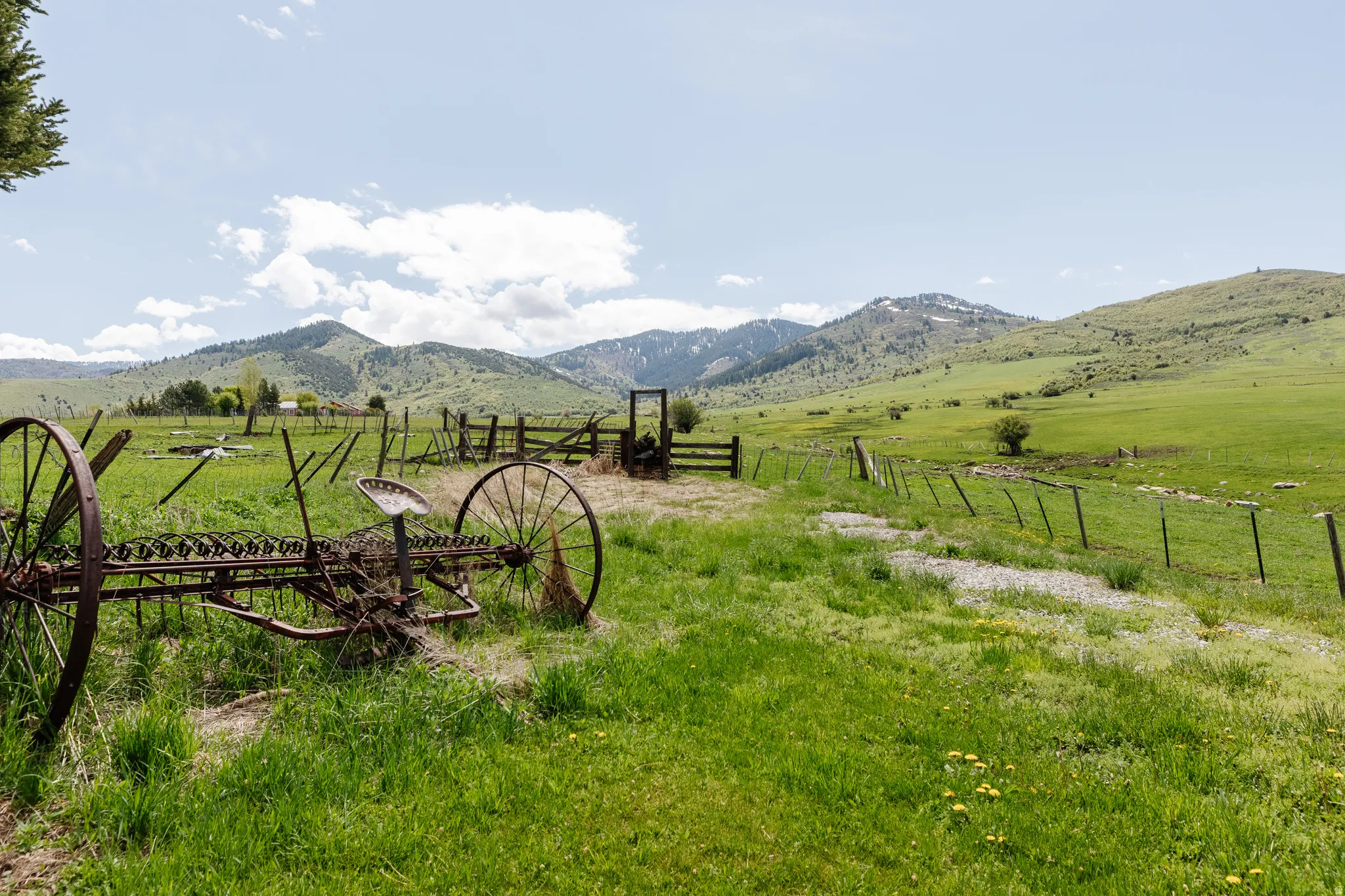 View of mountain backdrop featuring rural landscape