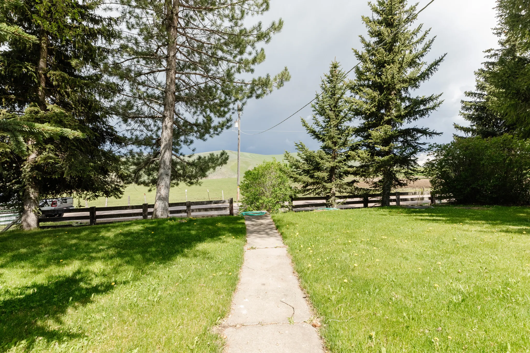 View of yard with a view of rural / pastoral area